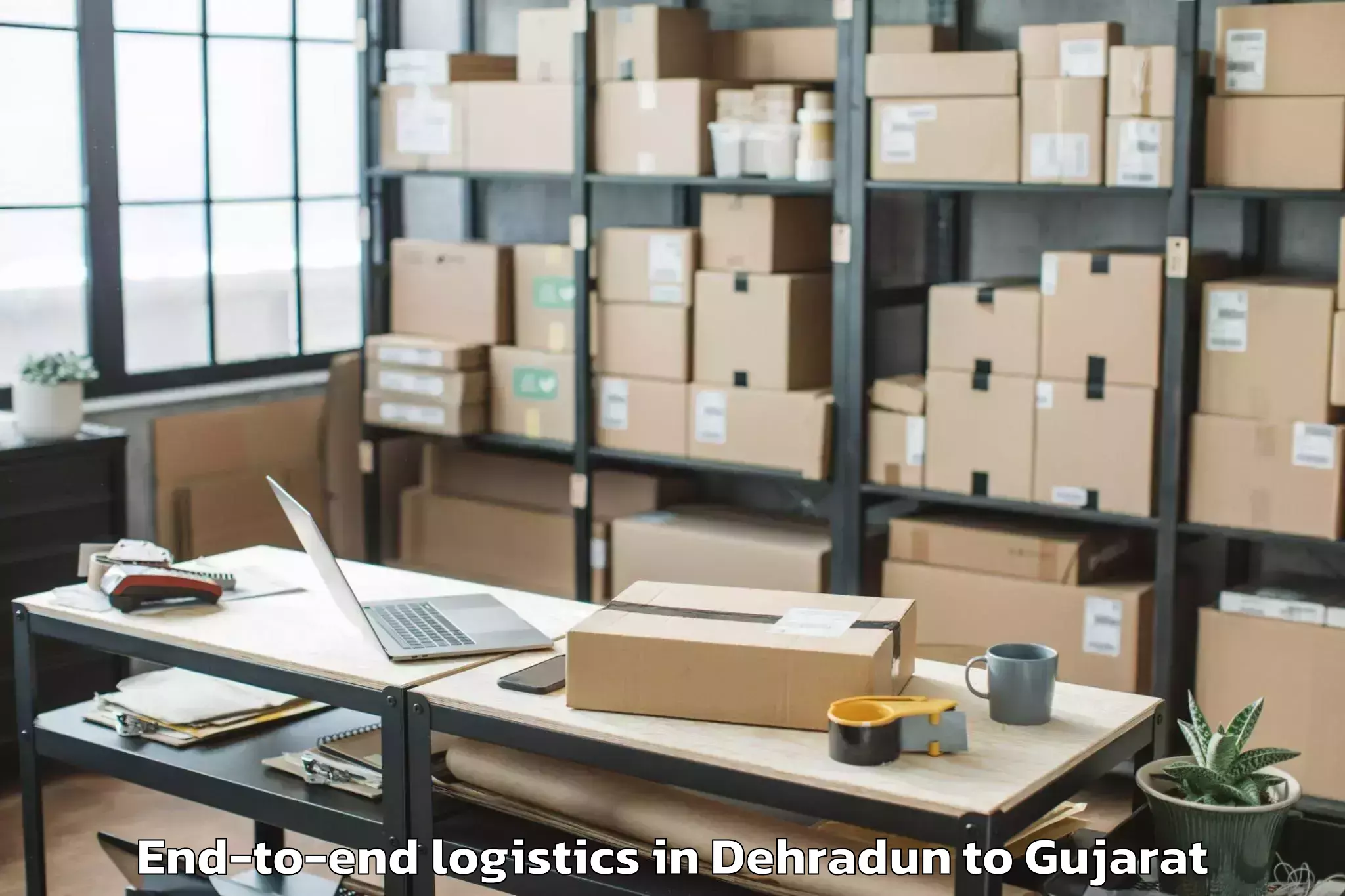 Expert Dehradun to Botad End To End Logistics